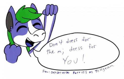 Tanby, the group mascot, a purple alien creature with green hair, pumps their fist in an excited cheer!